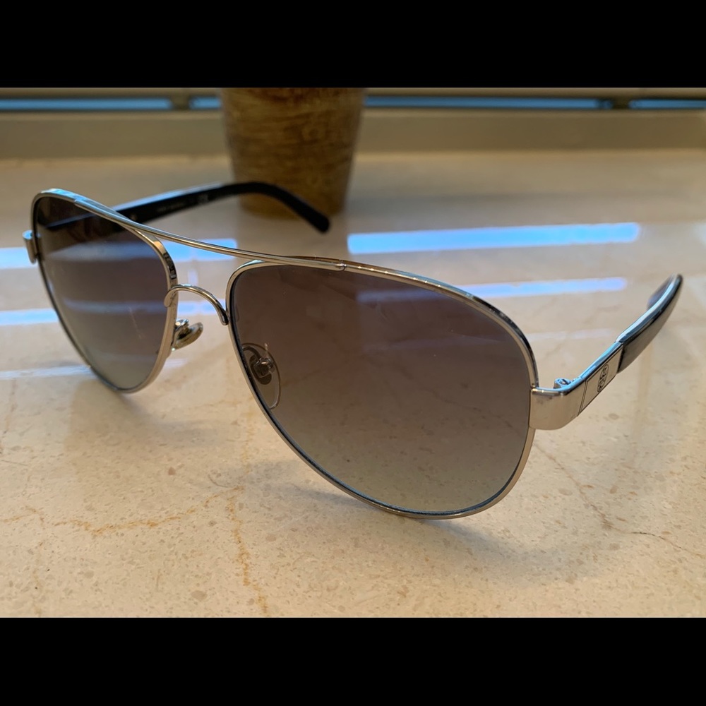 Tory Burch silver aviator sunglasses.
